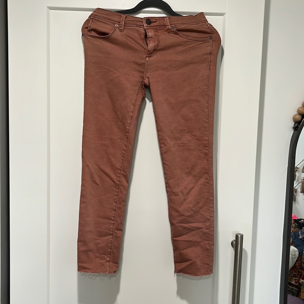 Size 27.  Free people leggings with raw hem.